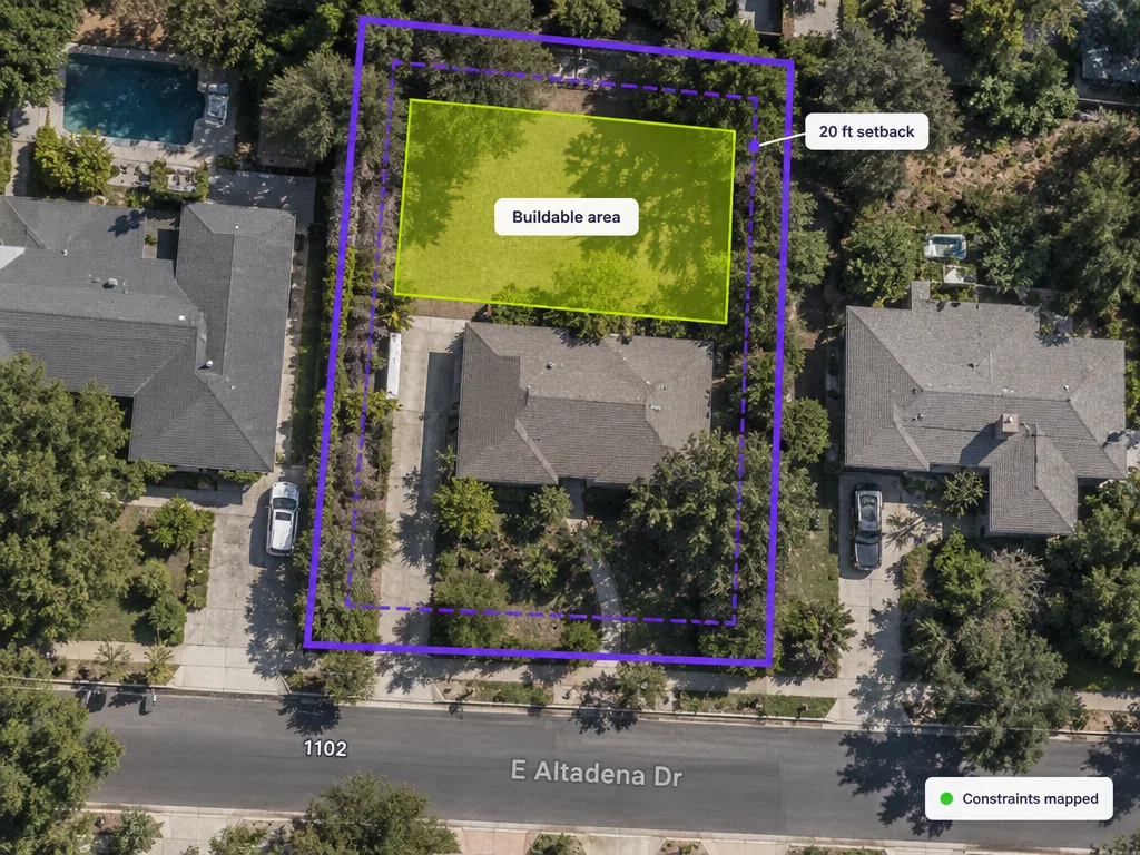 Interactive site mapping showing setbacks, buildable area, and parcel constraints on an aerial view